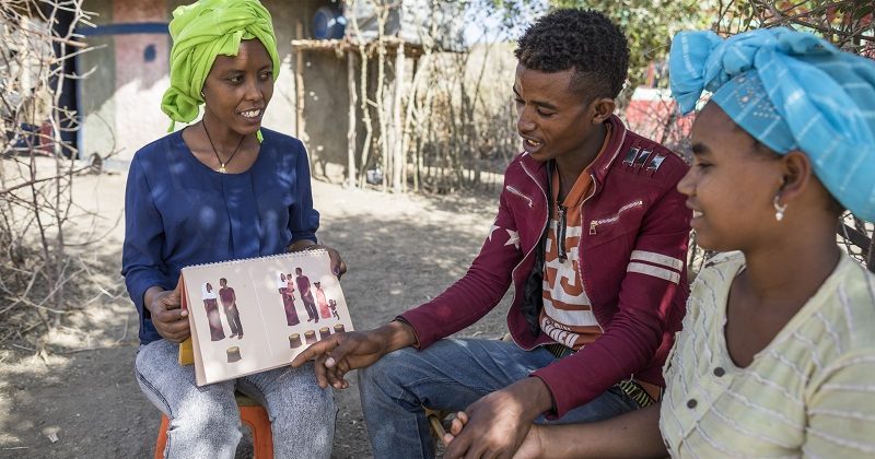 local health worker engages a couple in Smart Start